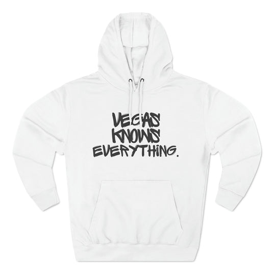 Vegas Knows Everything written in black graffiti on a white hoodie.